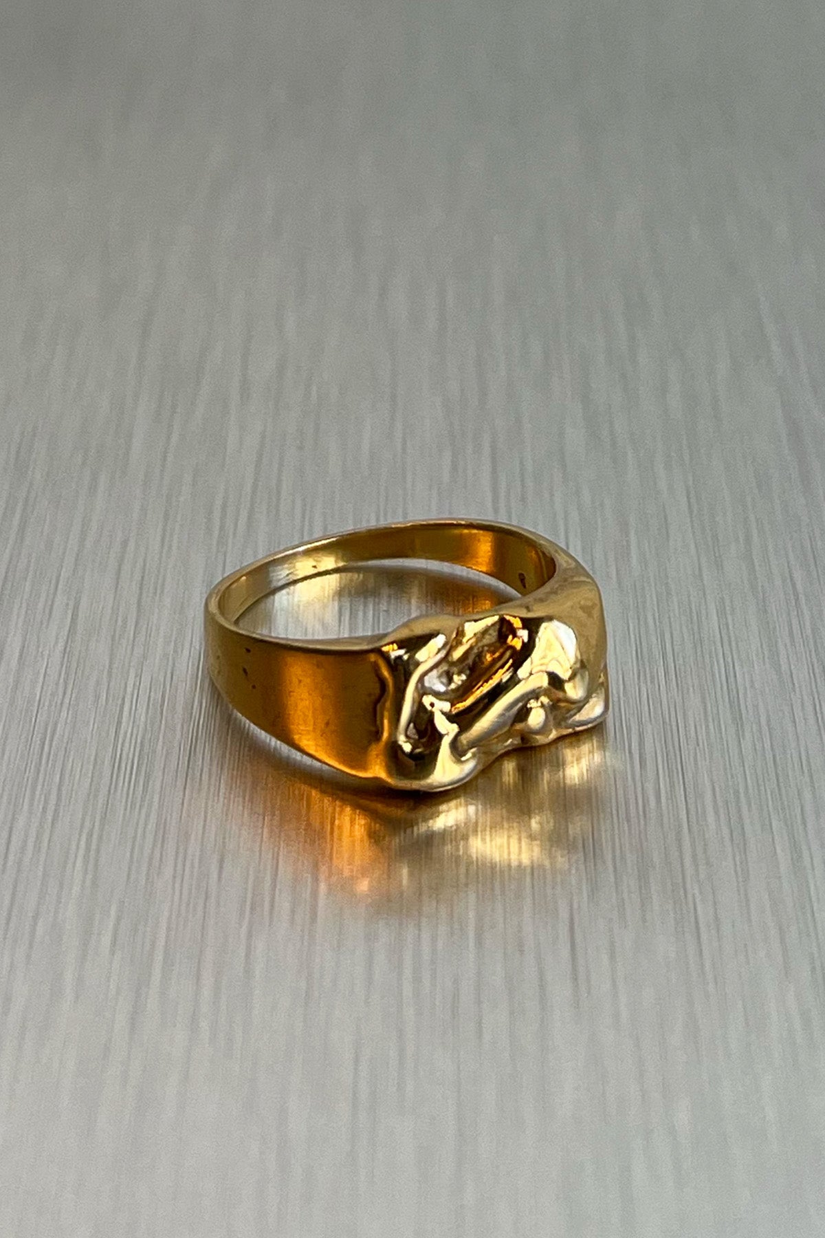 Gold imperfect ring
